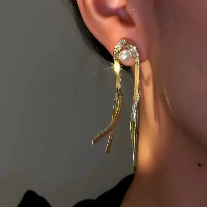 Close-up detail of the sparkling zircons and plating on the Pearl Tassel Earrings