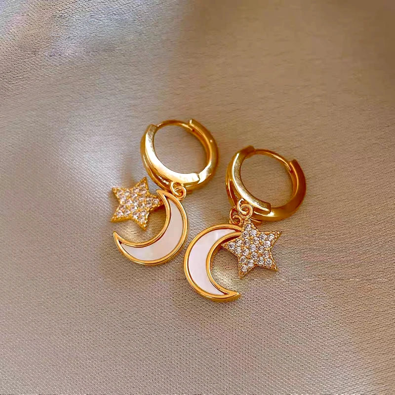 Close-up detail of the sparkling zircons and plating on the Moon Tassel Earrings