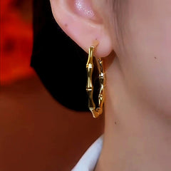 Close-up detail of the sparkling zircons and plating on the Large Bamboo Hoops