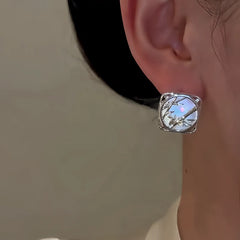 Close-up detail of the sparkling zircons and plating on the Bamboo Stud Earrings