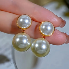 Close-up detail of the sparkling zircons and plating on the Gold Bead Earrings