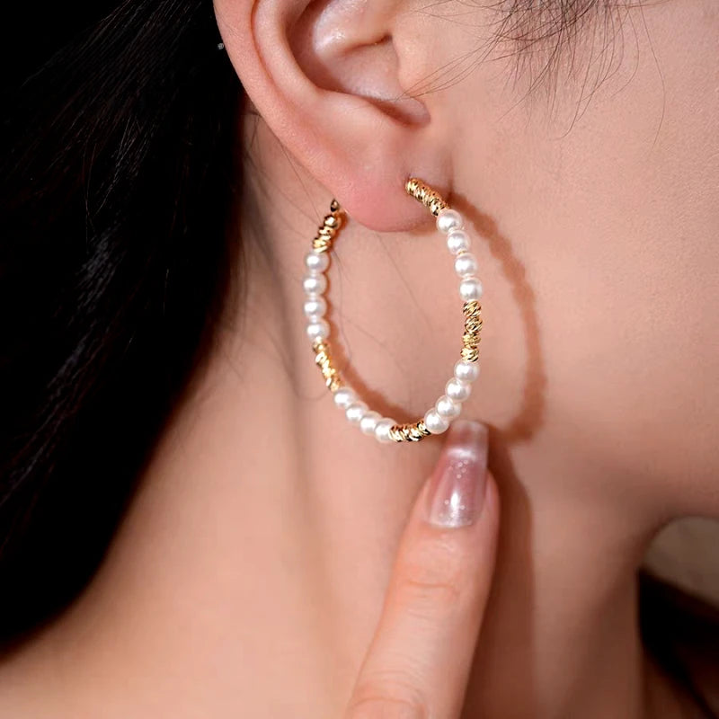 Close-up detail of the sparkling zircons and plating on the Bead Hoop Earrings