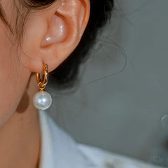 Close-up detail of the sparkling zircons and plating on the Gold Beaded Earrings