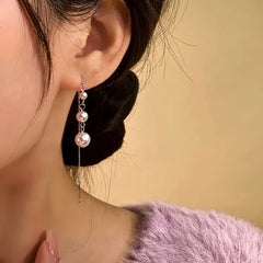 Close-up detail of the sparkling zircons and plating on the Beaded Threader Earrings