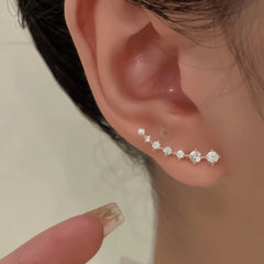 Model showcasing the dangle and style of the 14K Gold-Plated Elegant Big Dipper Zircon Earrings