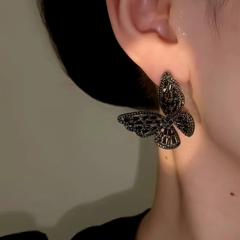 Close-up detail of the sparkling zircons and plating on the Black Butterfly Earrings