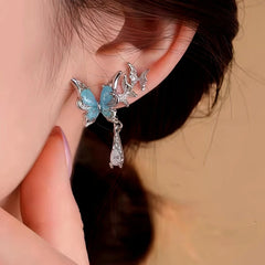 Close-up detail of the sparkling zircons and plating on the Blue Butterfly Earrings