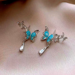 Angled view of the 14K Gold-Plated Elegant Blue Butterfly Zircon Water Drop Earrings