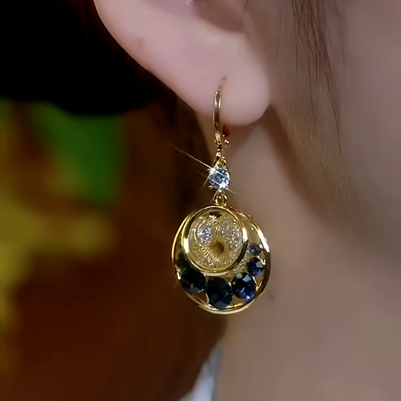 Close-up detail of the sparkling zircons and plating on the Mesh Water Drop Earrings