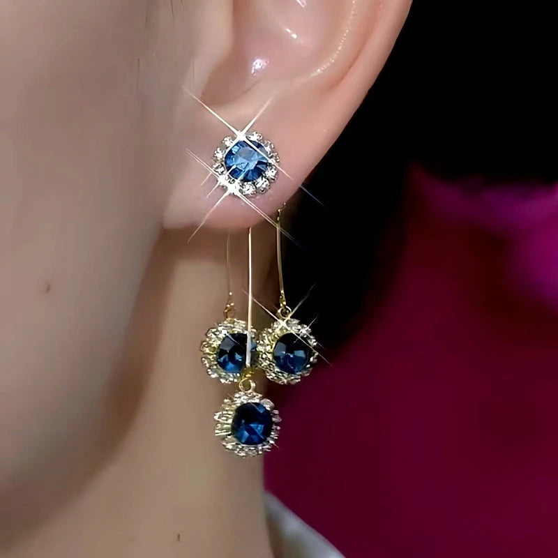 Close-up detail of the sparkling zircons and plating on the Blue Tassel Earrings