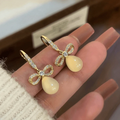 Close-up detail of the sparkling zircons and plating on the Water Drop Ear Hooks