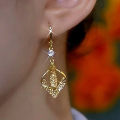 Close-up detail of the sparkling zircons and plating on the Brown Diamond Earrings