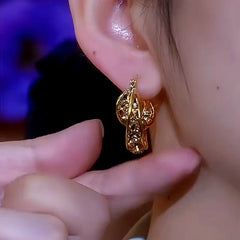 Close-up detail of the sparkling zircons and plating on the Brown Diamond Hoops