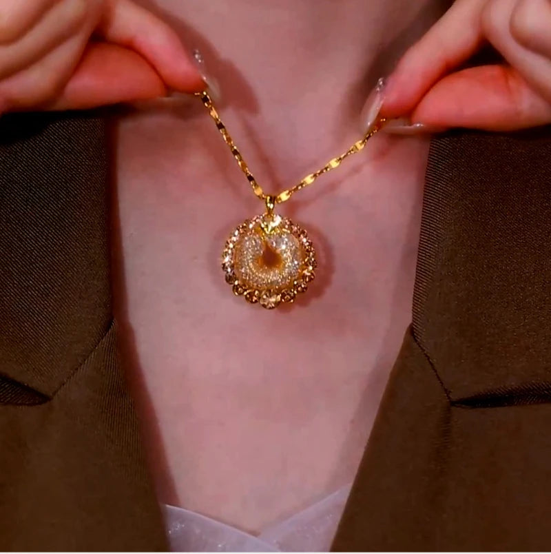 Close-up of the pendant and clasp on the Mesh Pendant Necklace