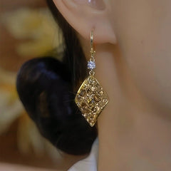 Close-up detail of the sparkling zircons and plating on the Brown Zircon Earrings