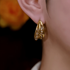 Close-up detail of the sparkling zircons and plating on the Brown Zircon Hoops