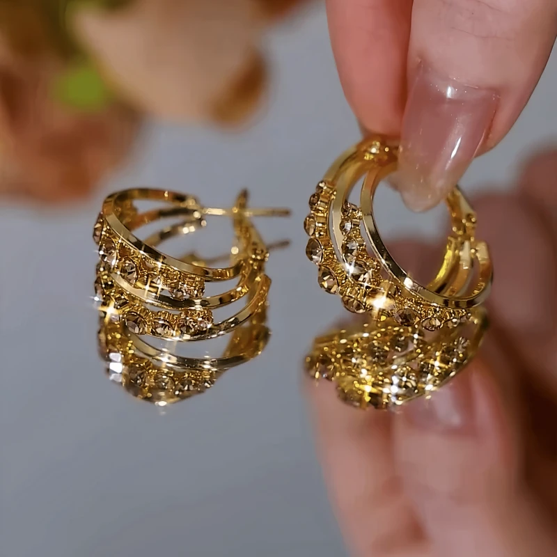 Angled view of the 14K Gold-Plated Elegant Brown Zircon Diamond Hoop Earrings
