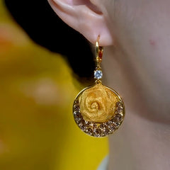 Close-up detail of the sparkling zircons and plating on the Rose Flower Earrings