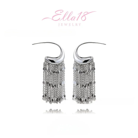 Model showcasing the dangle and style of the 14K Gold-Plated Elegant C-Shaped Tassel Earrings