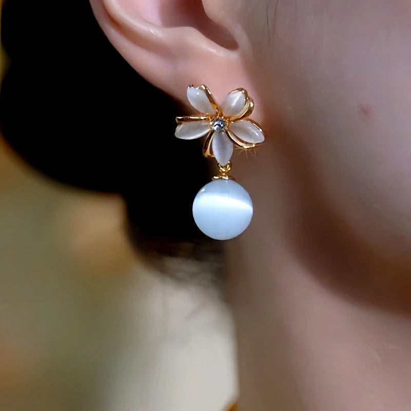 Close-up detail of the sparkling zircons and plating on the Flower Bead Earrings