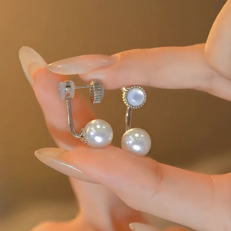 Close-up detail of the sparkling zircons and plating on the Pearl Jacket Earrings