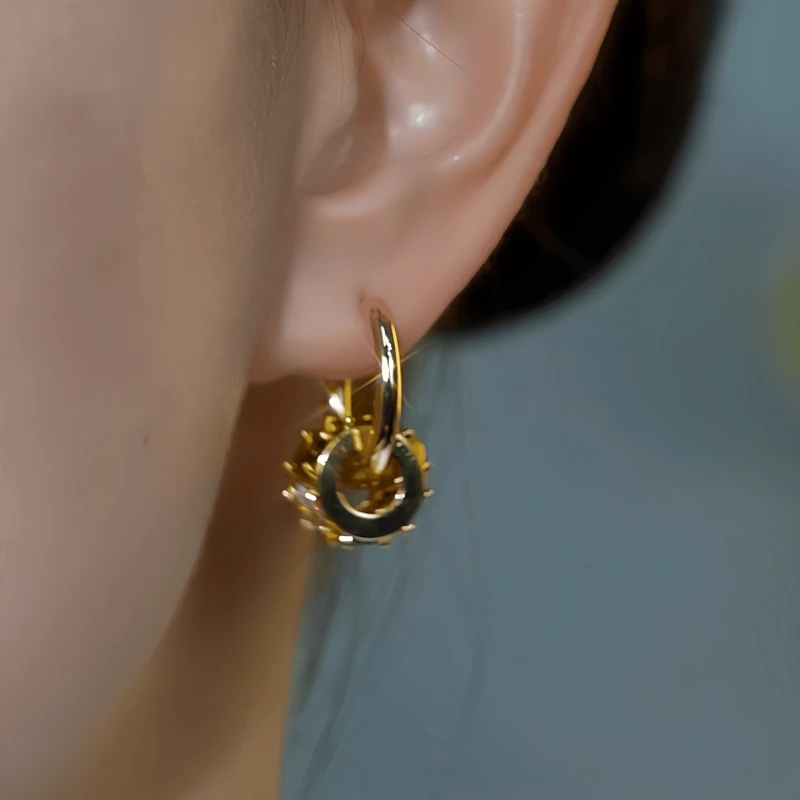 Close-up detail of the sparkling zircons and plating on the Cat's Eye Earrings