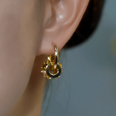 Close-up detail of the sparkling zircons and plating on the Cat's Eye Earrings