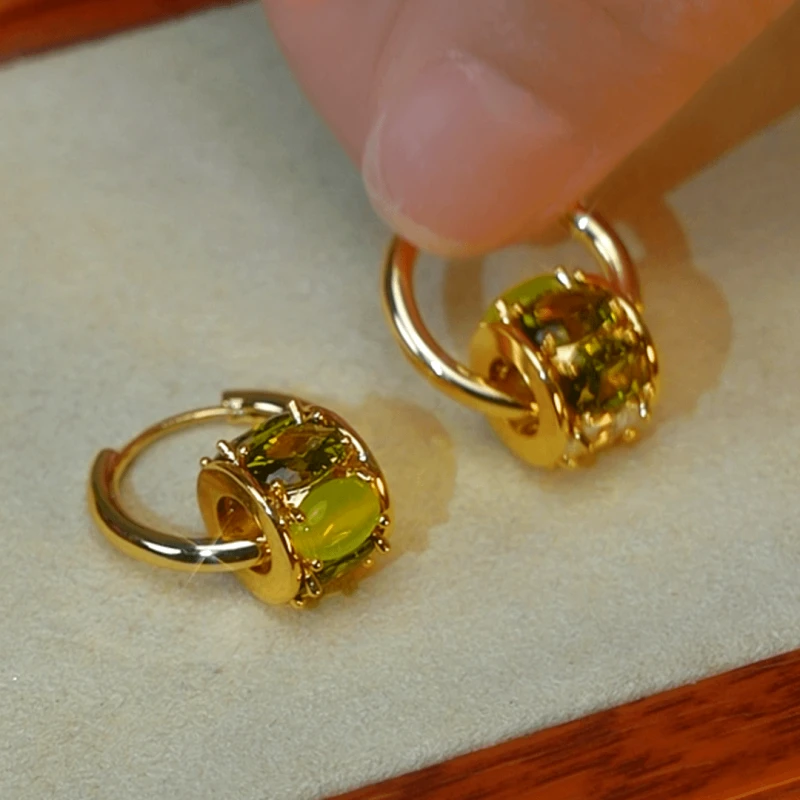 Angled view of the 14K Gold-Plated Elegant Cat's Eye Stone Ring Earrings