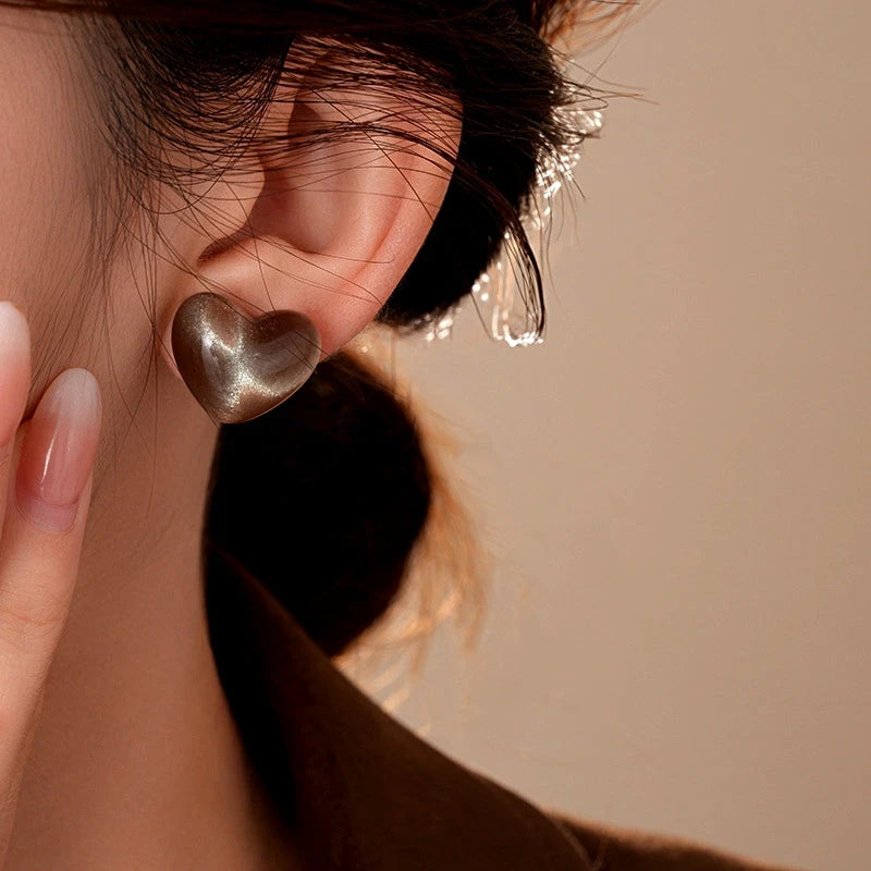 Close-up detail of the sparkling zircons and plating on the Cat's Eye Studs