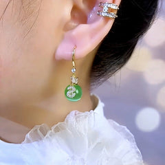 Close-up detail of the sparkling zircons and plating on the Cat's Eye Earrings