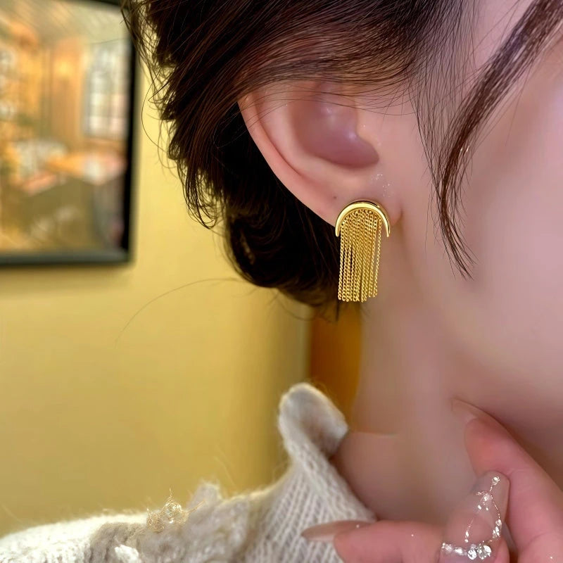 Close-up detail of the sparkling zircons and plating on the Chain Tassel Earrings