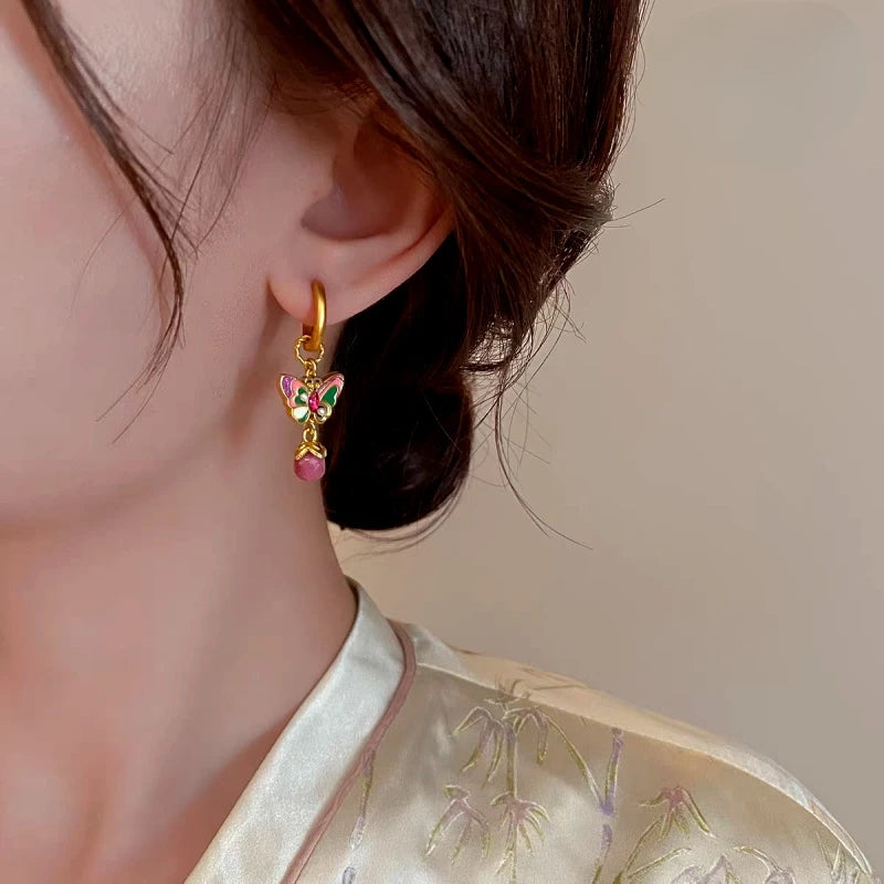 Close-up detail of the sparkling zircons and plating on the Butterfly Tassel Earrings