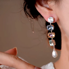 Close-up detail of the sparkling zircons and plating on the Pearl Tassel Earrings