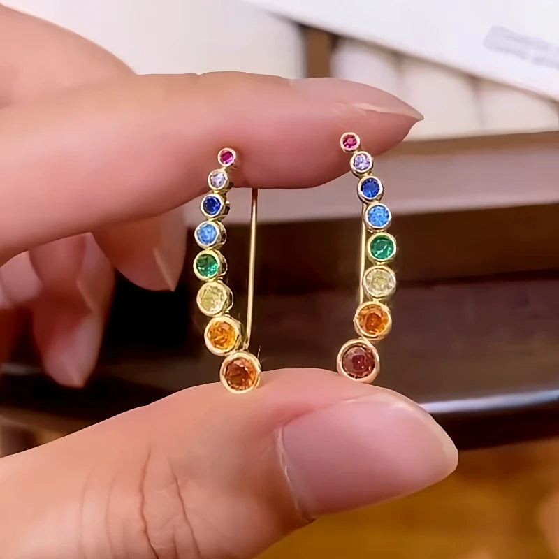 Model showcasing the dangle and style of the 14K Gold-Plated Elegant Colorful Zircon Diamond Crawler Earrings