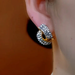 Close-up detail of the sparkling zircons and plating on the Cross Stud Earrings