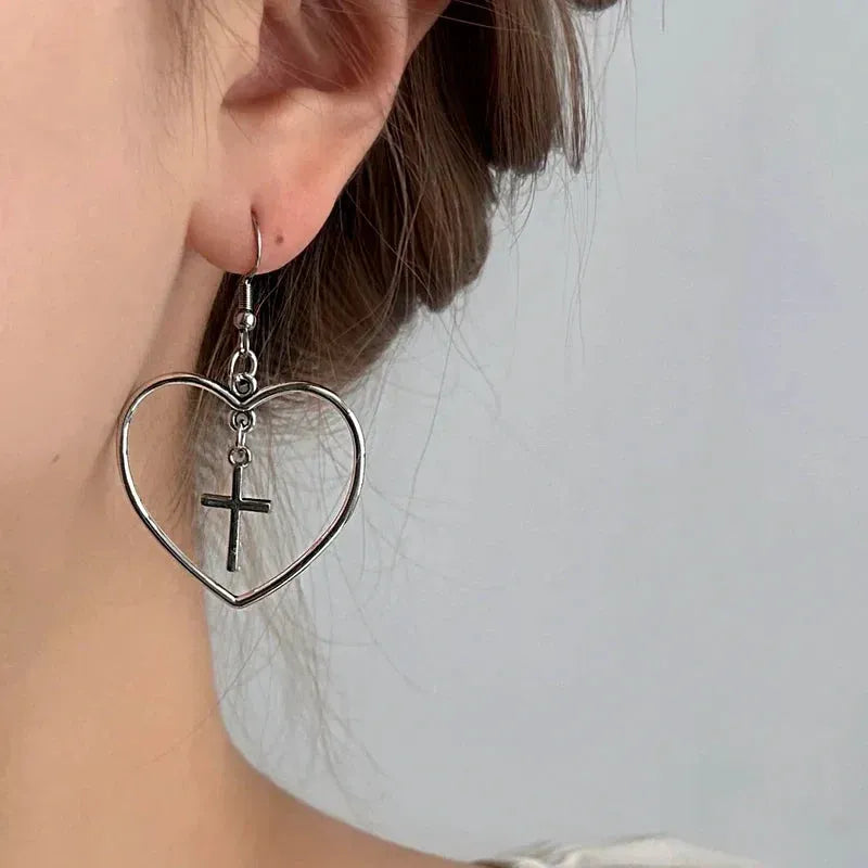 Close-up detail of the sparkling zircons and plating on the Heart Ear Hooks