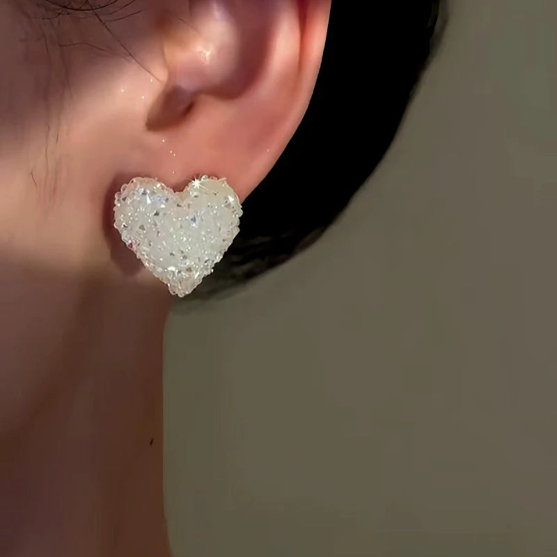 Close-up detail of the sparkling zircons and plating on the Crystal Heart Studs