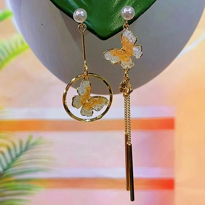 Close-up detail of the sparkling zircons and plating on the Butterfly Tassel Earrings