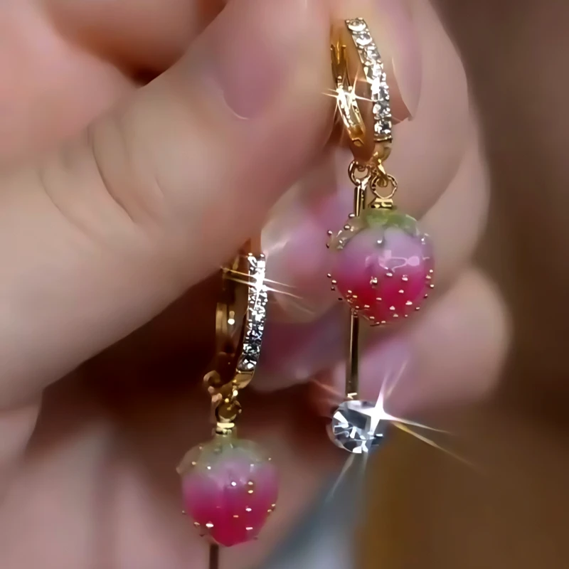 Close-up detail of the sparkling zircons and plating on the Strawberry Earrings