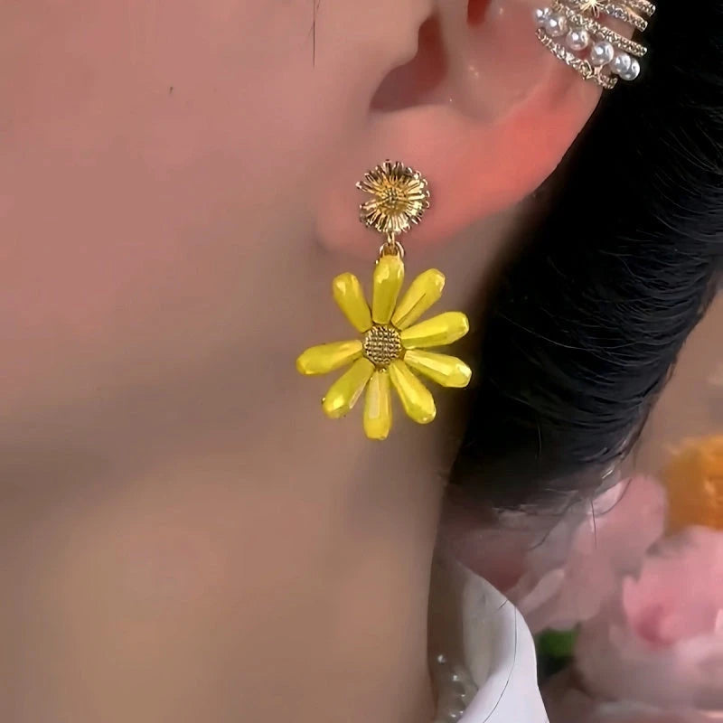 Close-up detail of the sparkling zircons and plating on the Daisy Tassel Earrings