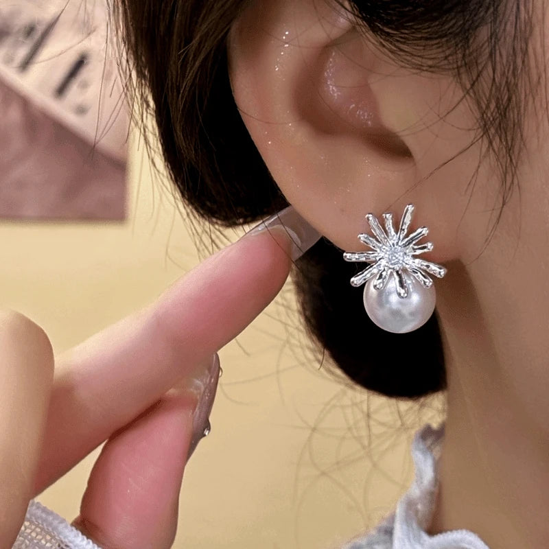 Close-up detail of the sparkling zircons and plating on the Daisy Petal Earrings