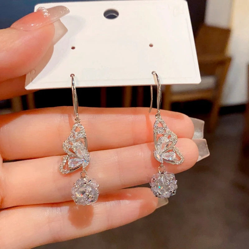 Close-up detail of the sparkling zircons and plating on the Butterfly Ear Hooks