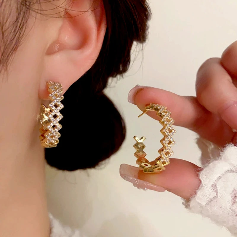 Close-up detail of the sparkling zircons and plating on the Diamond C-Shaped Hoops