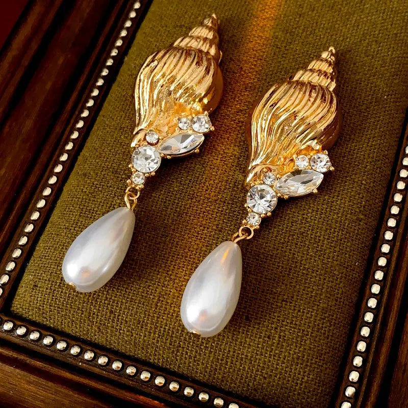 Close-up detail of the sparkling zircons and plating on the Pearl Drop Earrings