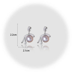 Angled view of the 14K Gold-Plated Elegant Diamond Ribbon Pearl Earrings