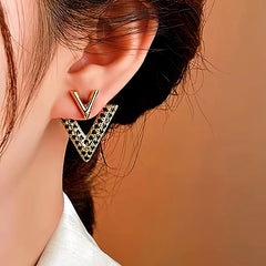 Close-up detail of the sparkling zircons and plating on the V Letter Ear Jackets