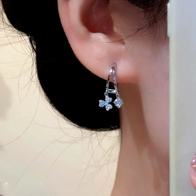 Close-up detail of the sparkling zircons and plating on the Leaf Tassel Earrings