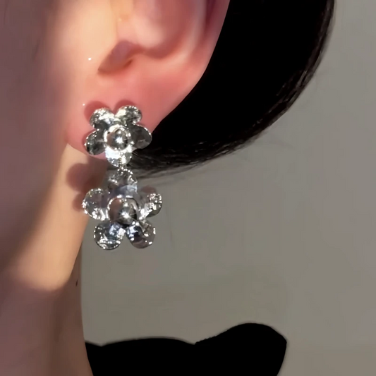 Model showcasing the dangle and style of the 14K Gold-Plated Elegant Double-Layer Flower Tassel Earrings