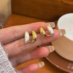 Close-up detail of the sparkling zircons and plating on the Double Layer Studs