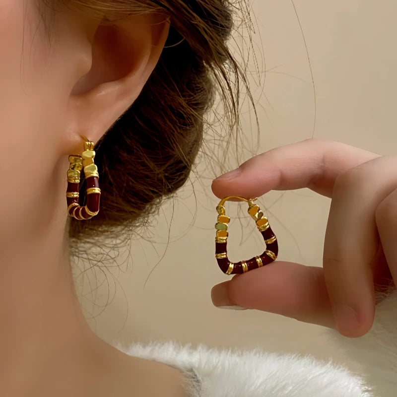 Close-up detail of the sparkling zircons and plating on the Enamel Drop Earrings